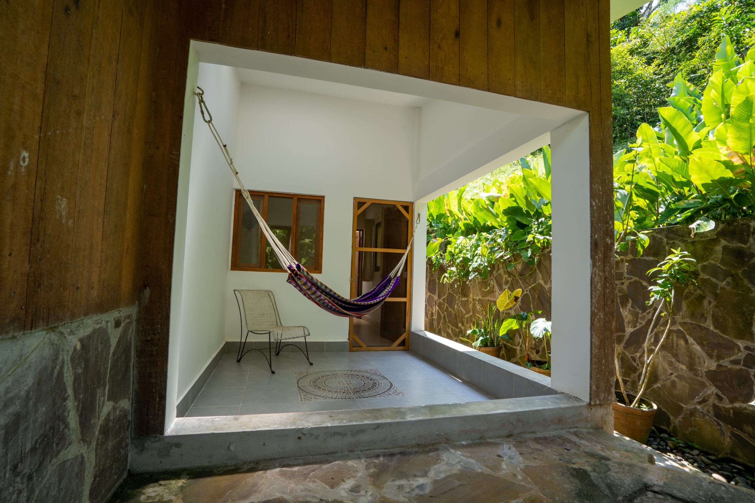 LA MEDICINA — AYAHUASCA RETREAT CENTER 42 terrace hammock scaled 1